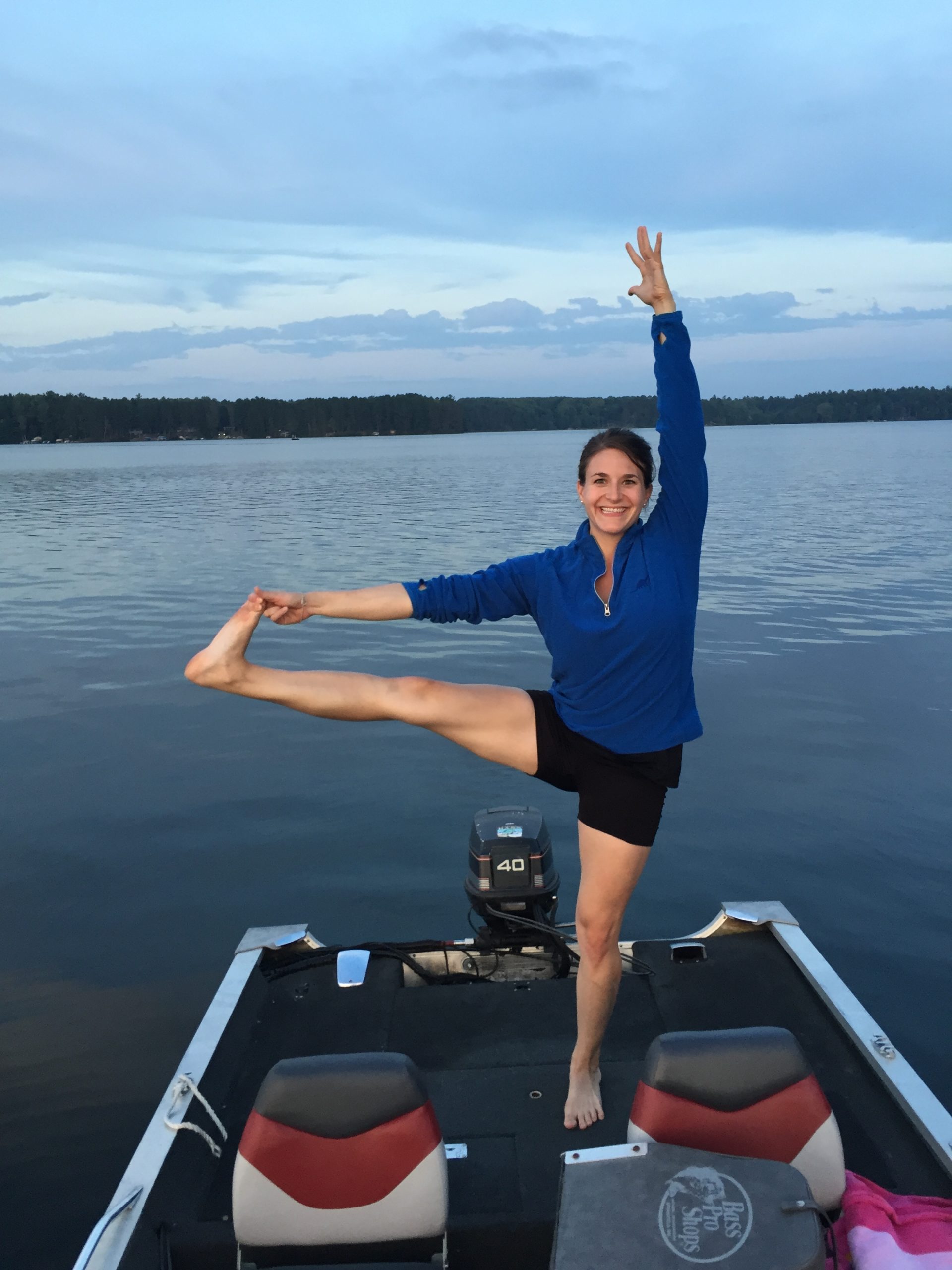 Lauren fitting in her yoga even on the lake!