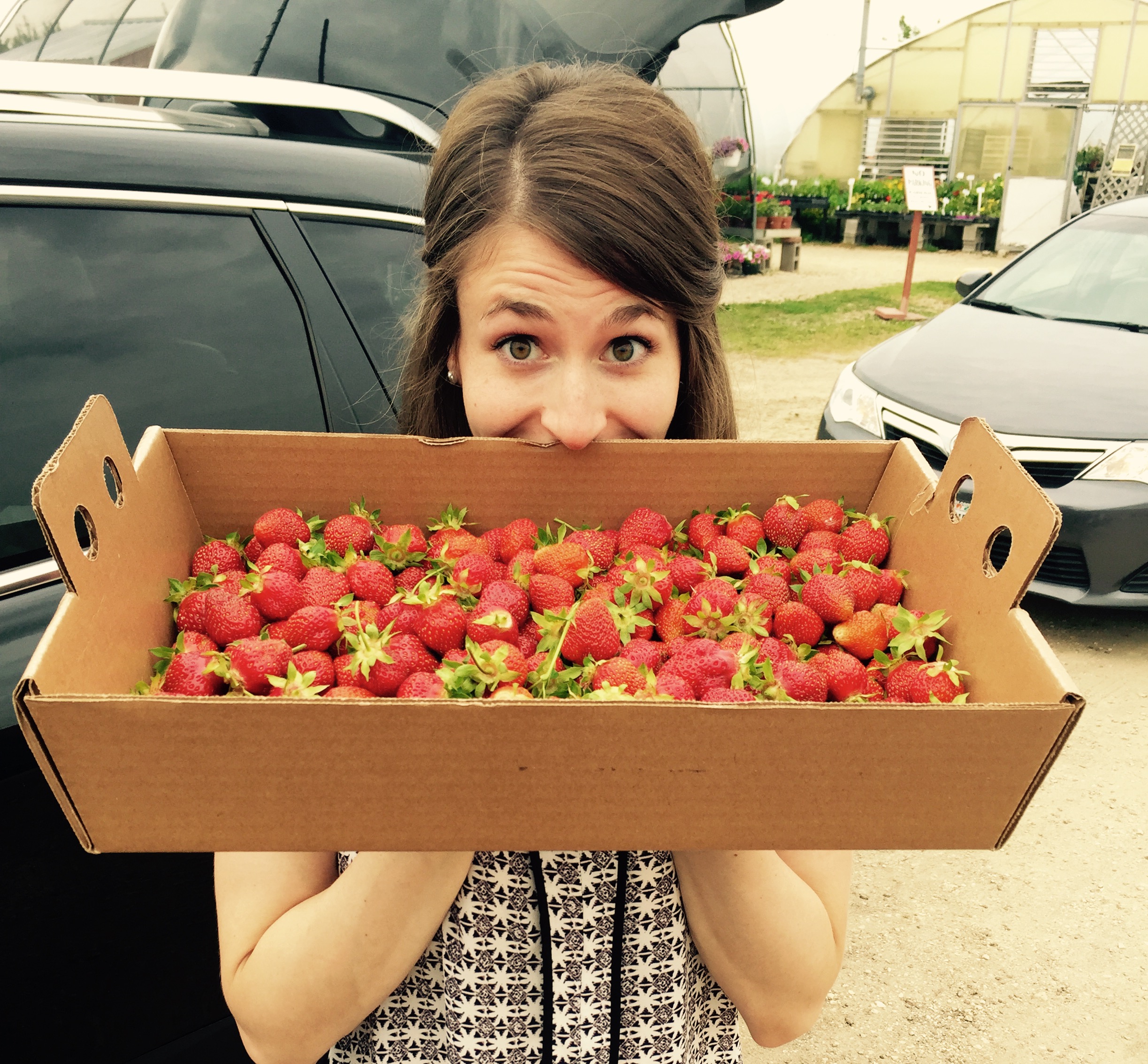 Mmmmm, strawberries! Freshly picked with our Nana.
