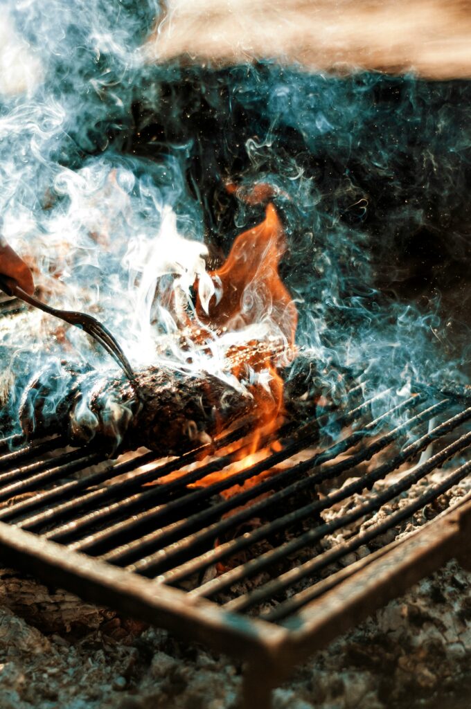The flame and smoke around meat can increase carcinogens. Learn healthy grilling options. 